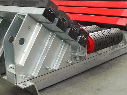 Side detail of an impact roller bed