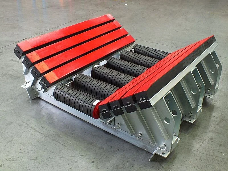 Impact roller bed with side support bars